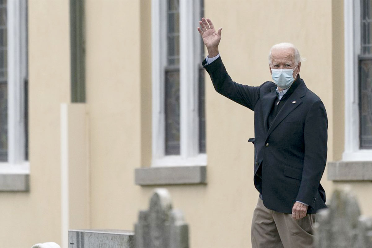 President-elect Joe Biden waves as he departs St. Joseph on the Brandywine Catholic Church, Nov. 15, 2020, in Wilmington, Del. // AP Photo/Alex Brandon