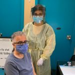 UM President and Vice-Chancellor Dr. Michael Benarroch gets his flu shot on campus from University Centre Pharmacist Anju Sareen.