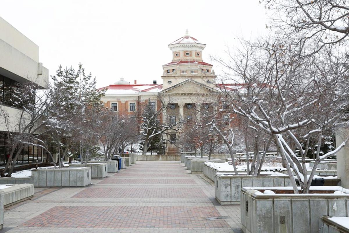 Winter on Fort Garry campus, looking at walkway along UMSU University Centre and towards the Administration Building.
