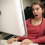 woman shocked during zoom call