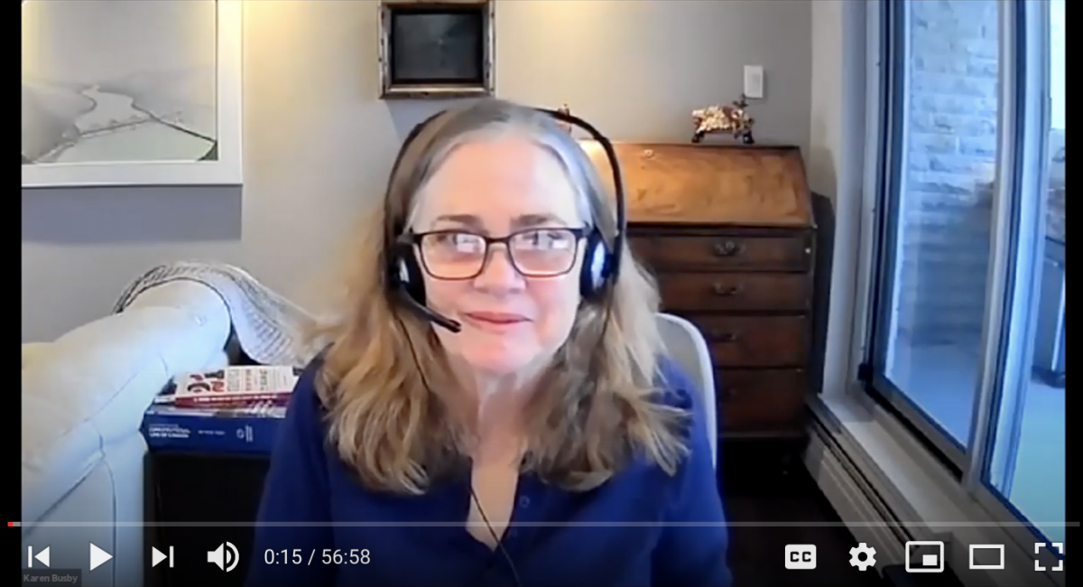 Law Professor Karen Busby wearing headphones on a Zoom call