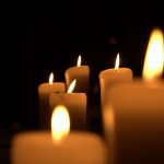 Candles lit for a memorial.