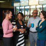 A group of UM faculty and staff in UCentre, pre-COVID