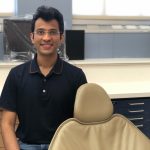 Dr. Rohan Kirtane sits in the dentistry clinic.