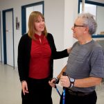Ruth Barclay works with a client learning to use Nordic walking poles.