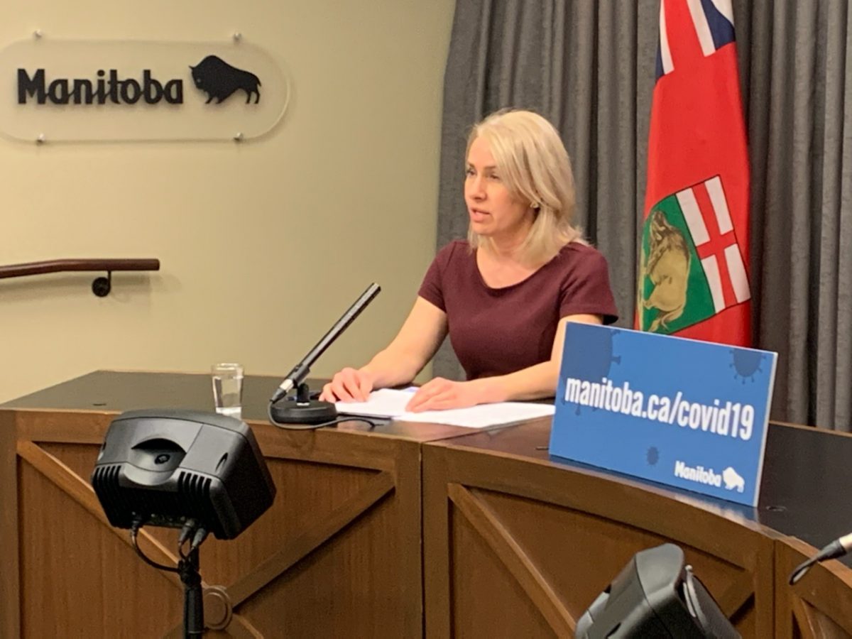 Shared Health chief nursing officer Lanette Siragusa addresses media at a news briefing.