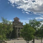 Admin building with flag at half mast
