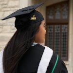 Graduating student in cap and gown