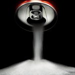 A pile of sugar pours out of a soda can.