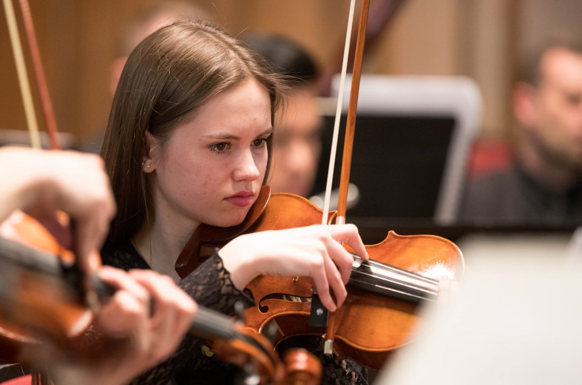 Student playing violin