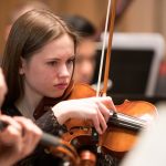 Student playing violin