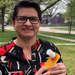 Dr. Diana Sanchez-Ramirez with a portable spirometer.