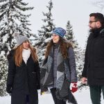 Three international students outside in winter.