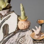 A close up photo of a ceramic abstract sculpture by Nickel.