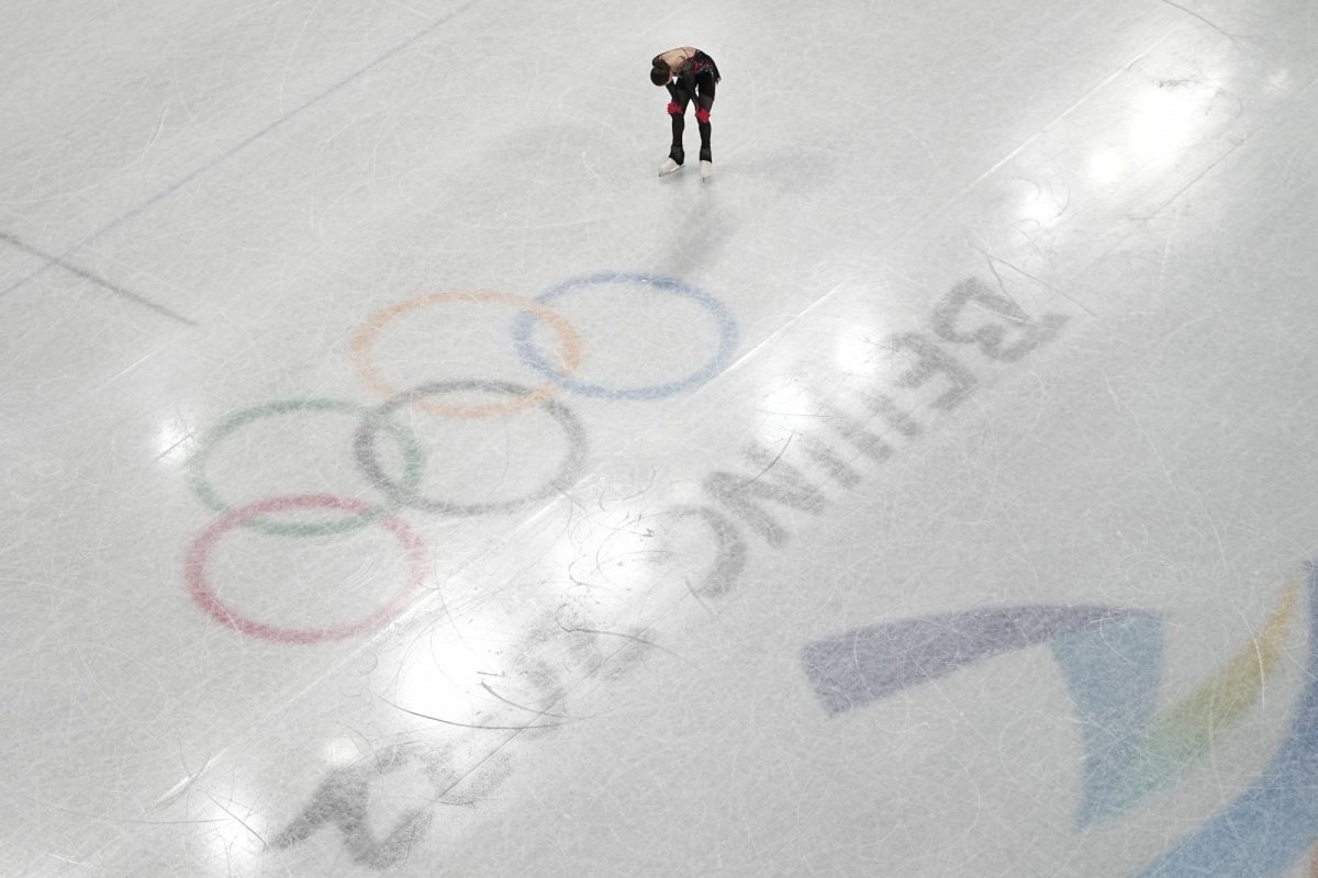 Fifteen-year-old Russian skater Kamila Valieva reacts after her routine in the women’s free skate program during the 2022 Winter Olympics. (AP Photo/Jeff Roberson)