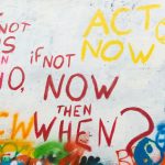 Street art in Prague reads: "if not us then who, if not now then when?"