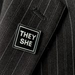 TransID pin that says TheyShe