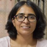 Asper student, Parneet Sandhar, smiling.