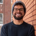 Kevin Prada is all smiles after being awarded his Alumni Association Scholarship. (Photo credit: La Liberté)