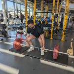 Amirali lifts weights