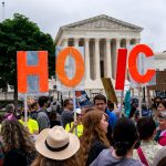 Abortion-rights demonstrators hold up letters spelling out ‘My Choice,’ Saturday, May 14, 2022, outside the United States Supreme Court in Washington, D.C. (AP Photo/Jacquelyn Martin)