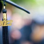 Closeup of a 2022 tassel on a graduation cap.
