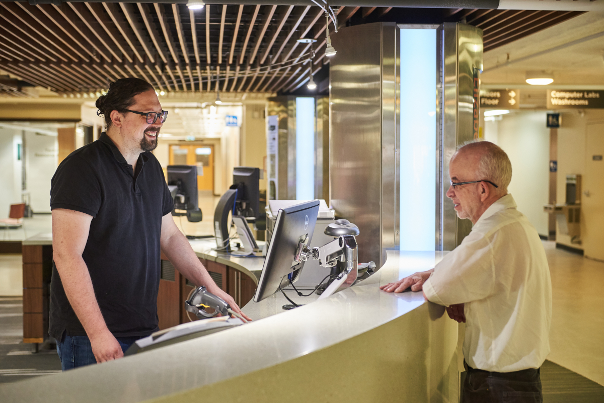 Helping at the Libraries service desk.