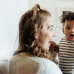 Parent and baby playing