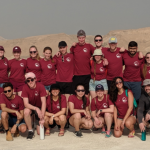 A group of students standing together in Israel