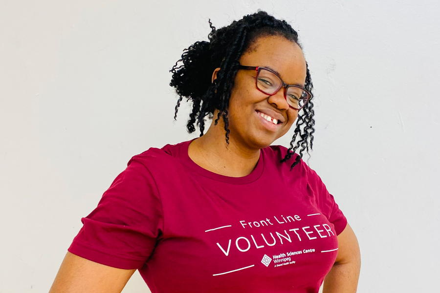 Kathleen Glover stands smiling