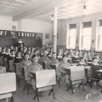 A black and white photo of the Shubenacadie Residential School classroom in Nova Scotia.