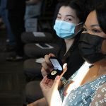 A student poses with her bachelor of nursing pin.