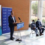 Rady Faculty of Health Sciences dean Peter Nickerson speaks at a media conference.