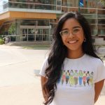 Marina Costa Fujishima stands outdoors on the Bannatyne campus.