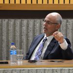 Photo of Supreme Court of Canada Justice Russell Brown speaking at Robson Hall's Moot Courtroom.