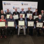 2022 Emeriti recipients pose with President Benarroch and Chancellor Mahon