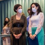 Dr. Kelekis-Cholakis is turned towards Samady. They are both wearing masks.