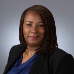 Woman in blue shirt - Keren Taylor-Hughes