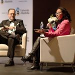 Dr. Peter Nickerson and Senator Gigi Osler sit on the stage at the awards evening.