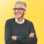 President Michael Benarroch with crossed arms and a smile