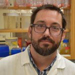 Portrait of Dr. David Safronetz in his lab.