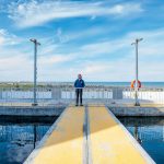 Researcher Eric Collins stands on the deck of the Churchill Marine Observatory