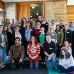 Group of instructors smiling for a posed photograph.