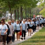 A crowd of people walking at the 2023 Sneaker Day event