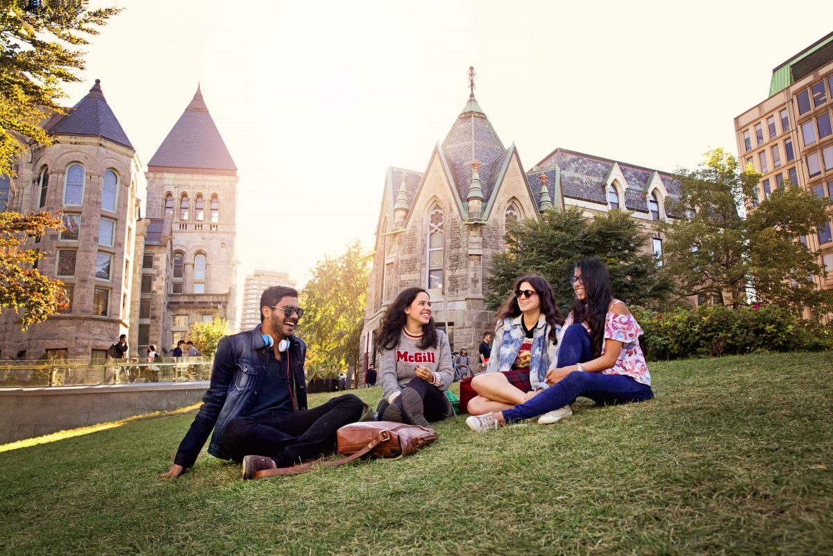 Student group sitting on "the beach" in front of Redpath Museum Valeria Lau at McGill University (April 2018)