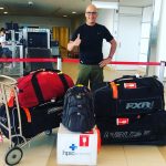 Gordon Giesbrecht standing inside the Winnipeg airport preparing to depart for Ukraine.