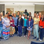 A group of individuals posing for a photo.