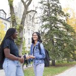 Students are photographed outside on a sunny day on the University of Manitoba's Fort Garry campus on September 19, 2019. (Photo by Marianne Helm / University of Manitoba)