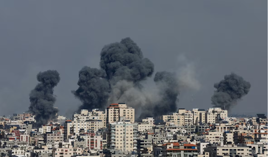 Smoke rises following Israeli strikes in Gaza on Saturday. (Mohammed Salem/Reuters)