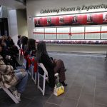 Dean Friesen speaking to crowd at Celebrating Women in Engineering Wall